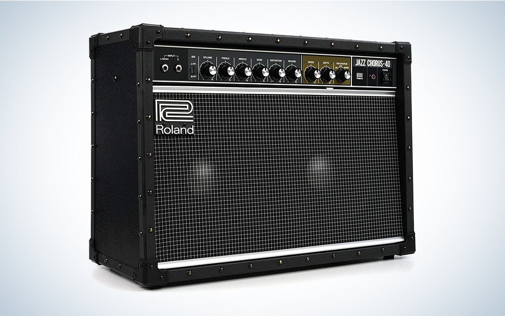 A Roland JC-40 guitar amp on a blue and white background
