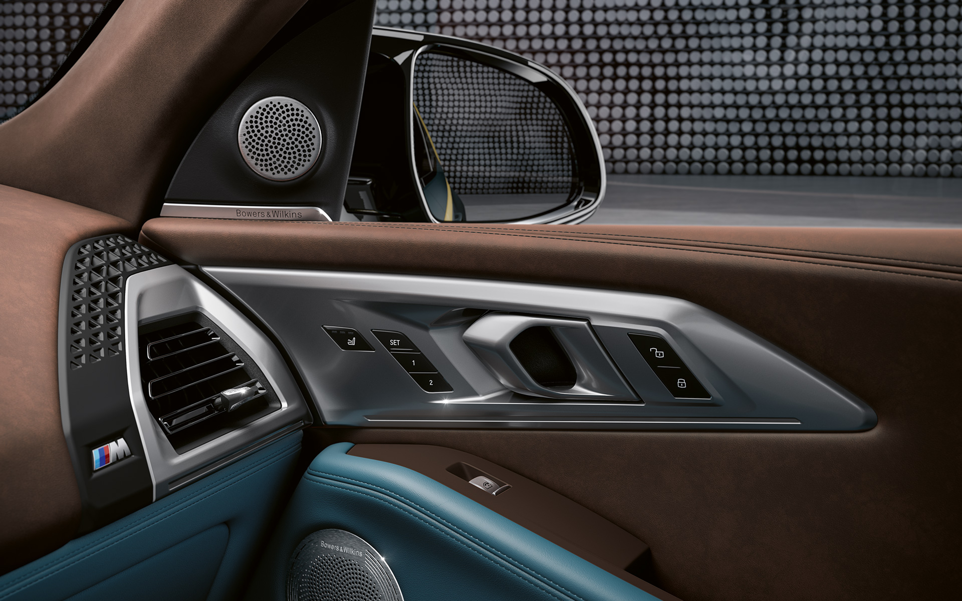 BMW XM G09 Bowers & Wilkins Diamond Surround Sound System Elegant, two-tone door design with Vintage leather and integrated Bowers & Wilkins Diamond Surround Sound System.