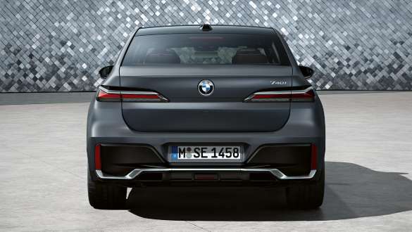Rear view BMW 7 Series Sedan G70 ICE 740i M sports package BMW 7 Series Sedan G70 ICE 740i M sports package Frozen Deep gray metallic rear view