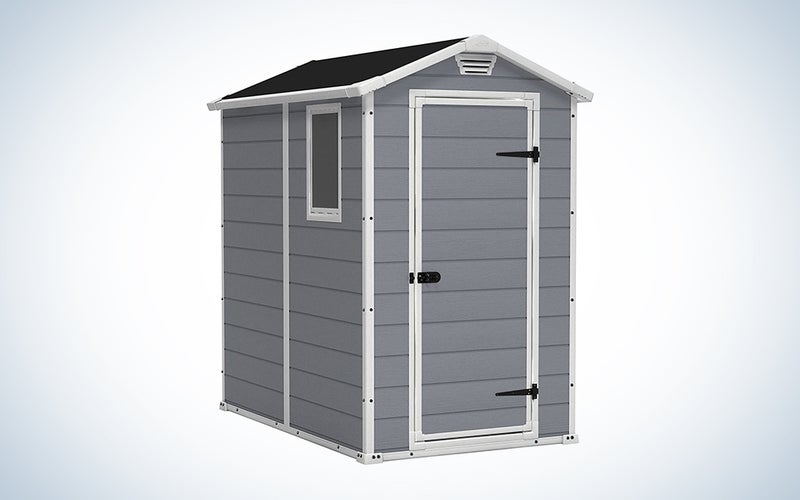 gray storage shed with white trim