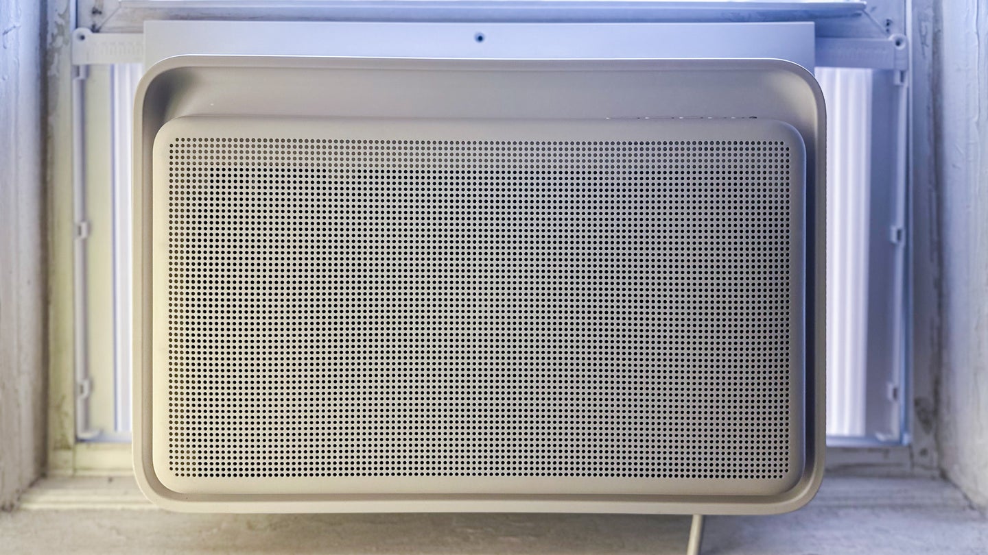 Windmill AC with WhisperTech in an apartment window (color-corrected header)